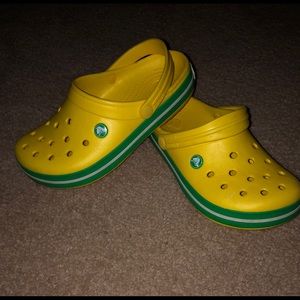 Yellow and green Crocs